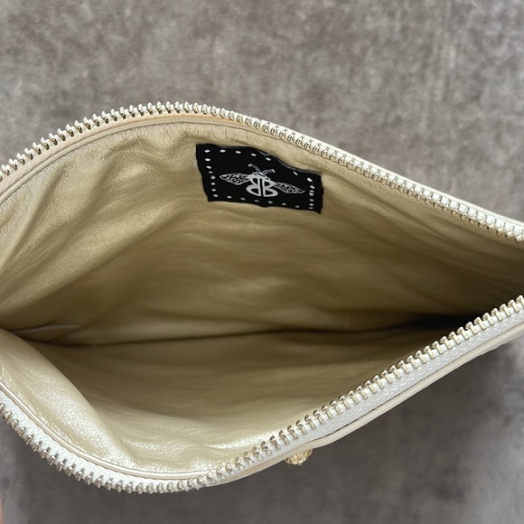 Bumble Bee clutch with wrist band. Color cream. Faux reptile design. Zip top - Picture 4 of 8